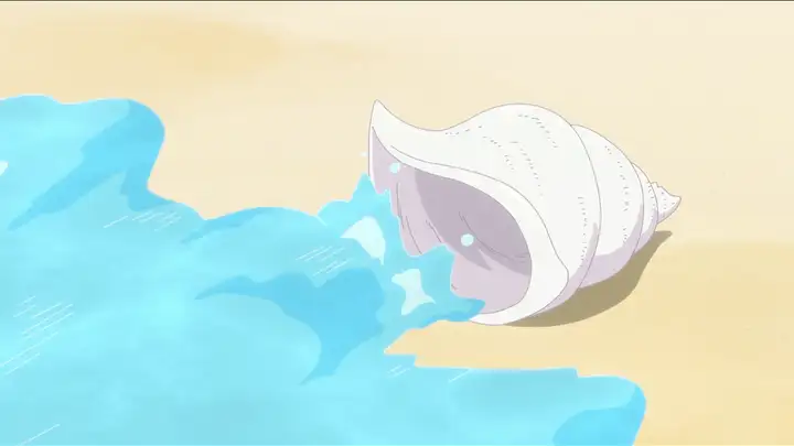 波に流される貝殻